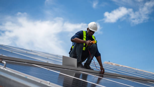 istock Service engineer checking solar cell on the roof for maintenance if there is a damaged part. Engineer worker install solar panel. Clean energy concept. 2187086202