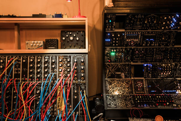 Synthesizer musical equipment in sound recording studio. Professional hi-fi audio equipment for music producer.