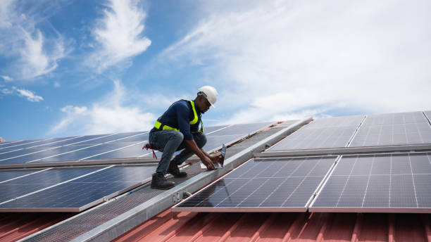 istock Service engineer checking solar cell on the roof for maintenance if there is a damaged part. Engineer worker install solar panel. Clean energy concept. 2187086344