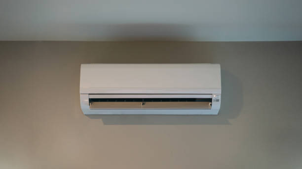 istock Air conditioner on a white wall, perfect for cooling during hot summers. 2187087121