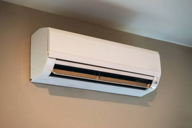 istock Air conditioner on a white wall, perfect for cooling during hot summers. 2187087177