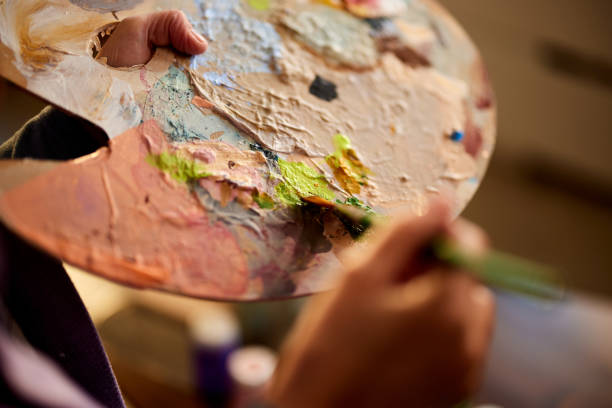 istock Colorful palette in artist's hand! 2187087198