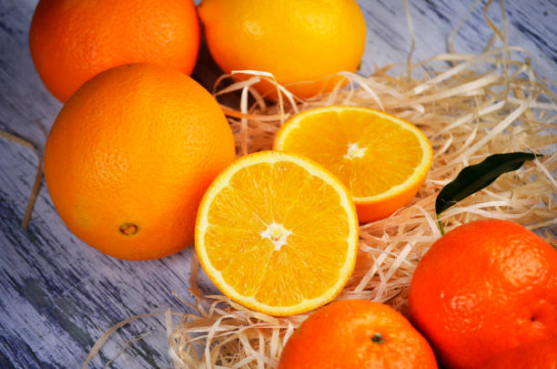 istock Citrus fresh fruit on the white wooden table 2187087382