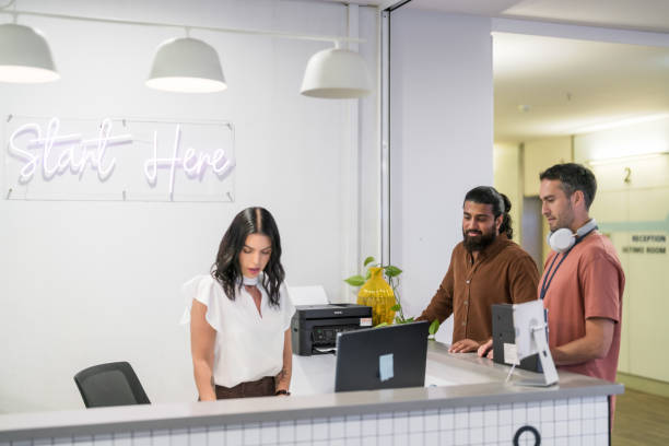 istock Clients first point of contact at office. 2187088271