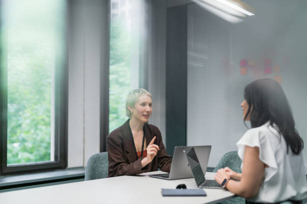 istock Management business meeting in office using technology. 2187088338