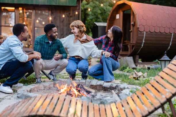 istock Friends enjoying a bonfire party in a cozy backyard setting 2187089776