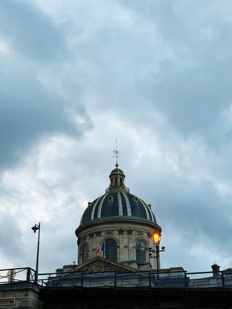 istock Historic dome Institut de France architecture under a dramatic cloudy sky 2187091099