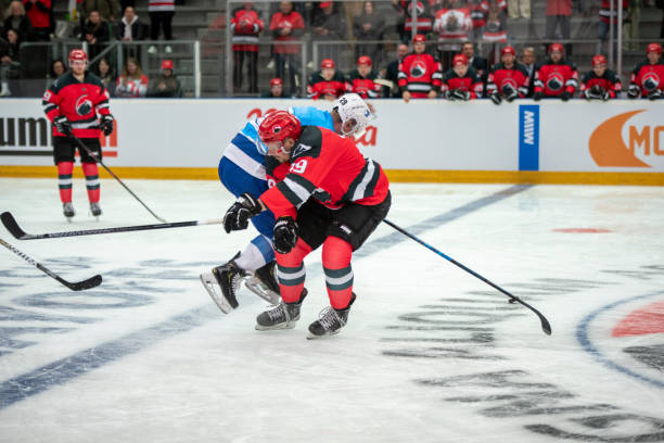 istock A Powerful Body-Check During Intense Hockey Play 2187096318