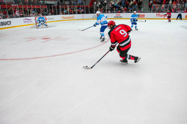 istock Hockey Player Approaching the Goal 2187096320