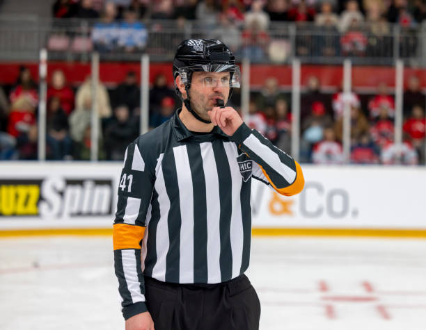 istock Focused Ice Hockey Referee in Action 2187096366