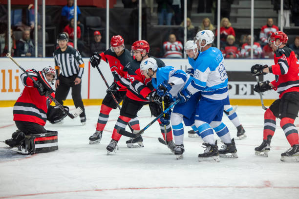 istock Intense Ice Hockey Goal Attempt 2187096424