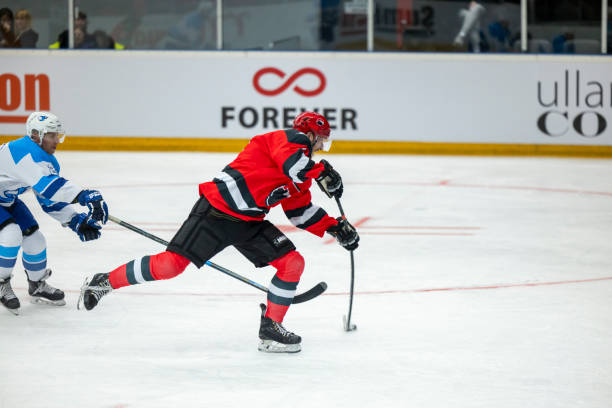 istock Ice Hockey Player in Action: Powerful Shot 2187096428