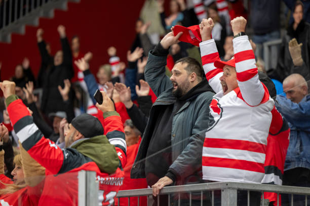 istock Cheering Hockey Fans in Excitement 2187096571