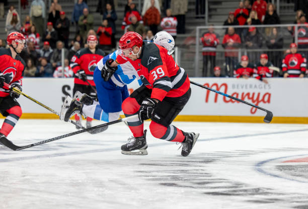 istock A powerful bodycheck between two players in the middle of the game 2187096830