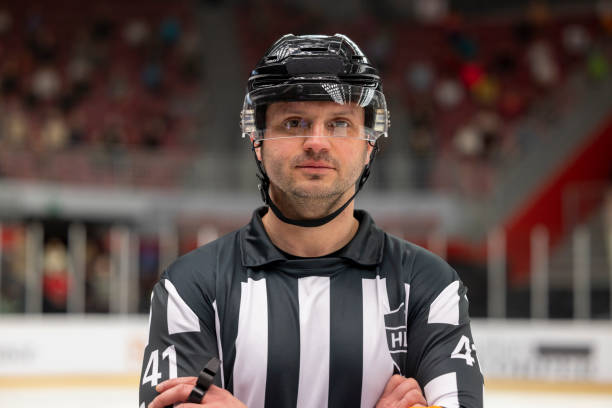 istock Ice Hockey Referee in Focused Stance 2187096909