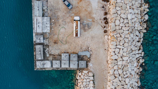 istock 25-35 Ton Mooring Block Construction, Secure and Durable Solution for Anchoring Ships 2187097482