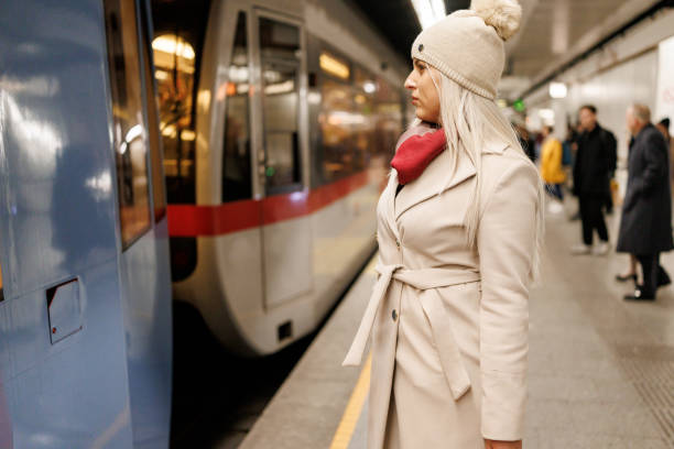 istock Woman waiting for the train in subway station 2187097865
