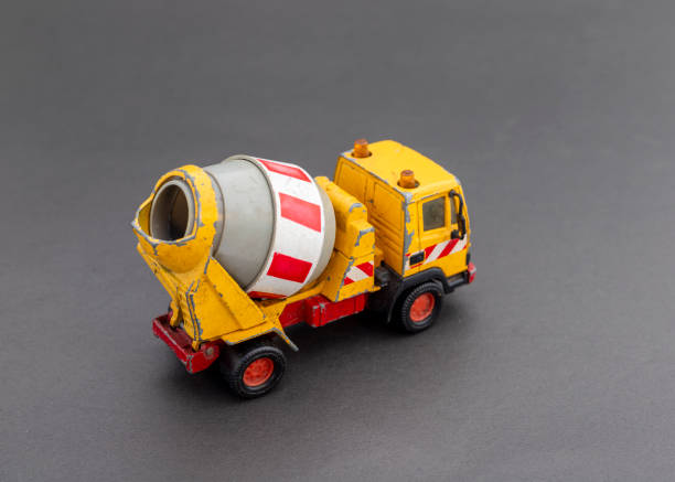 istock Miniature toy cement mixer truck. selective focus with copy space for text. 2187097933