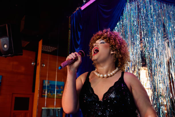 istock Eccentric drag queen spreads joy with bold performance during holiday show 2187099149
