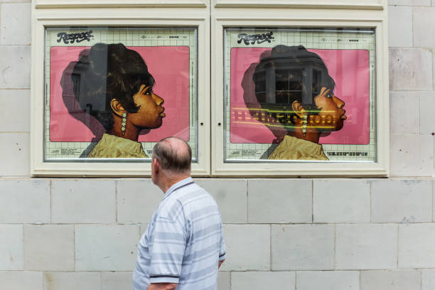 A man walks in front of the Electric Cinema on Portobello Road, London, United Kingdom. One of the oldest working film theatres in Britain, it became the country's first black-owned cinema in 1993 and remained so until it was sold in 2000.