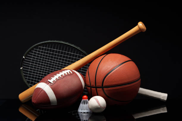 istock Various sports equipment on black background studio shot 2187099435