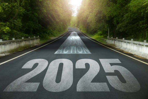 istock Starting 2025 Goal plan action, Business target and growth strategy. New year resolution and challenge. 2025 written on the road in the middle of an asphalt road with Goal plan action. way to success 2187100213