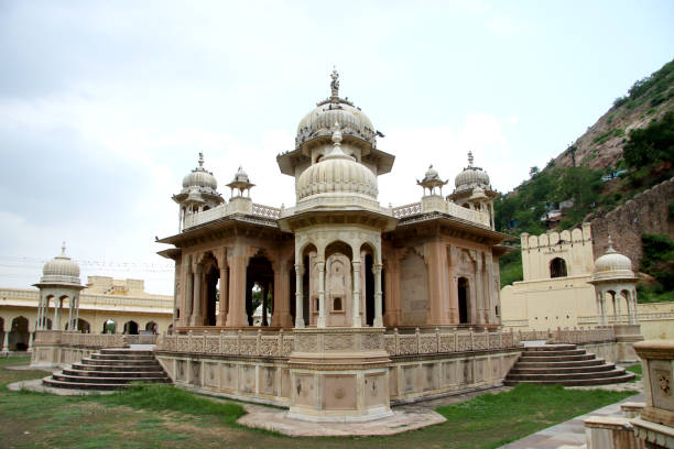 Woman in the arch looking at Amber fort in Jaipur