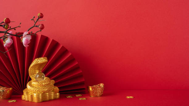 istock A vibrant red background featuring a gold snake with coins, cherry blossoms, and traditional elements symbolizing Chinese New Year 2025 celebration 2187102104