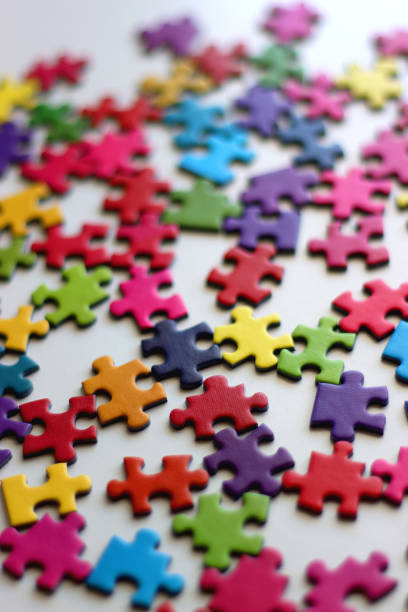 istock Colorful Jigsaw Puzzle Pieces 2187102693