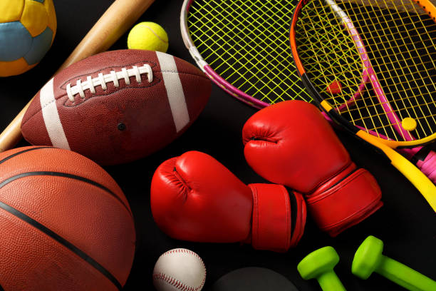 istock Various sports equipment on black background studio shot 2187103129