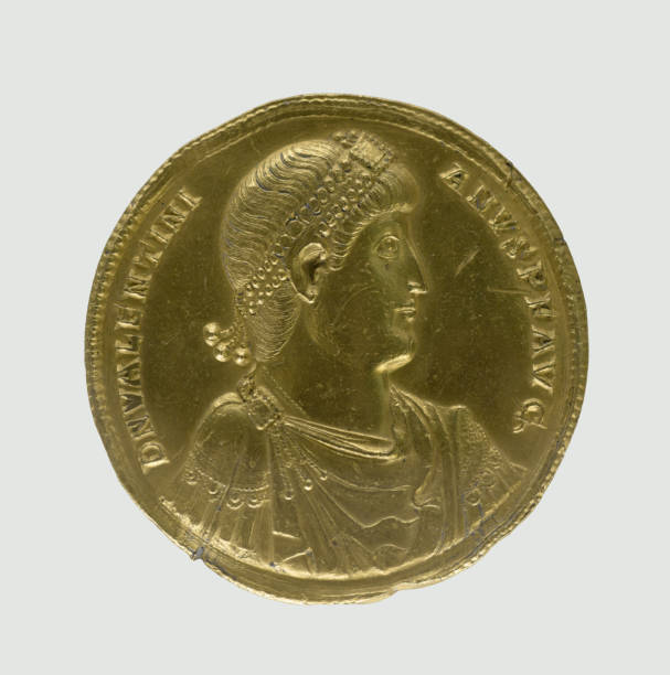 istock Roman gold coin (medallion) by Emperor Valentinian I 2187103859