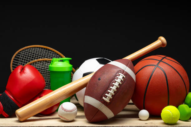 istock Various sports equipment on black background studio shot 2187103872