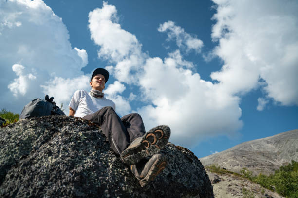 istock Young Man Enjoying Scenic Mountain View in Nature 2187105059