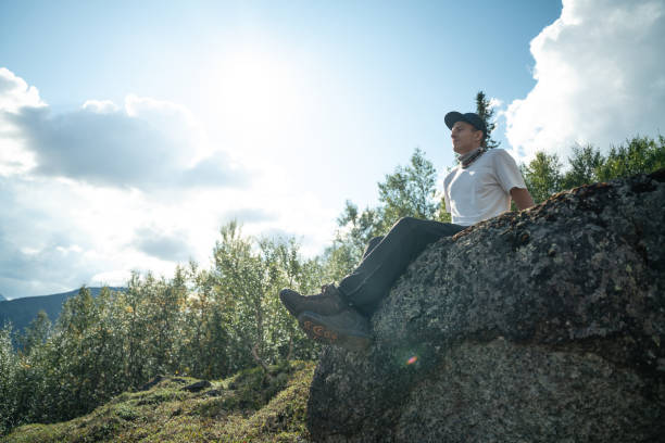 istock Young Man Enjoying Scenic Mountain View in Nature 2187105073