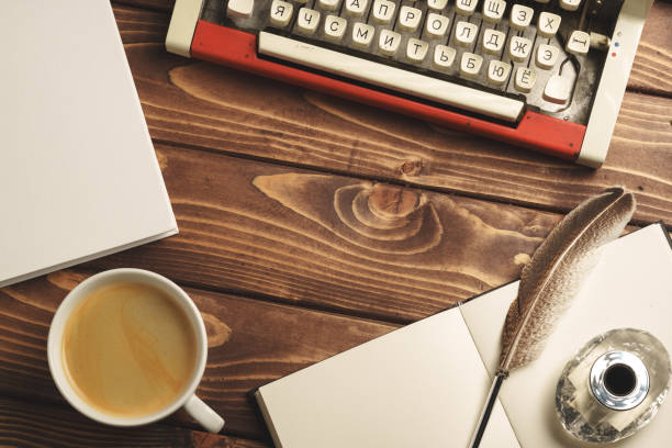 Vintage typewriter on wooden table close up