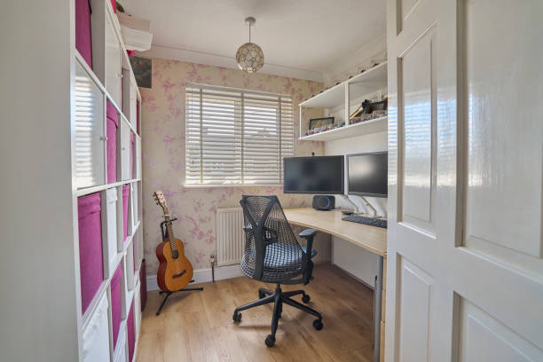 istock Interior Of House Showing Home Office With Computer Desk And Storage 2187106349