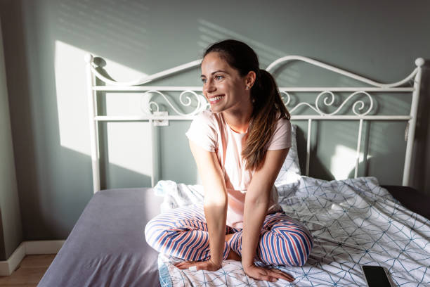 istock Relaxed morning vibes: Young woman enjoying her weekend 2187107004