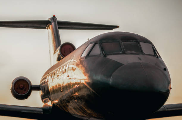 large airliner against the sunset evening sky close up