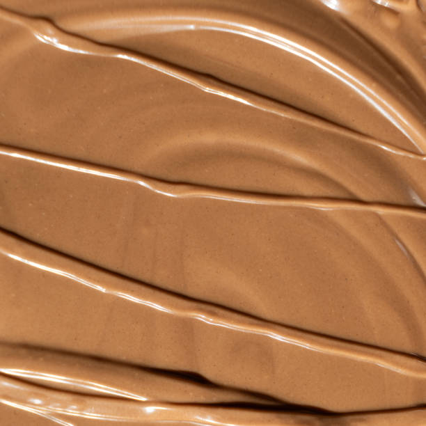istock Real Melted Milk Chocolate Top View, Chocolate Texture. 2187110385