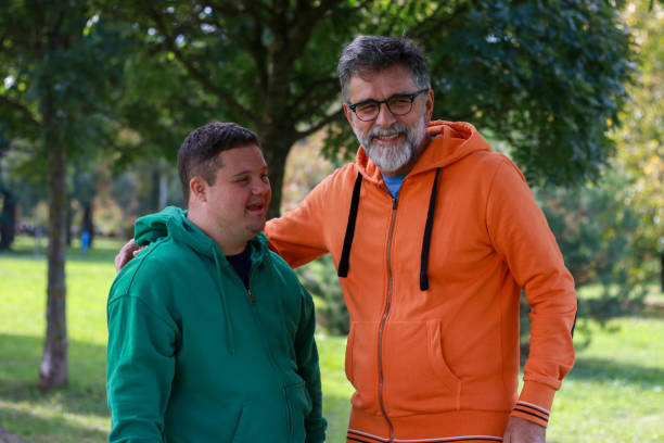 istock Young man and his dad having fun in nature 2187112583