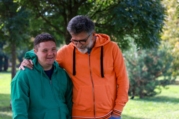 istock Young man and his dad having fun in nature 2187112585