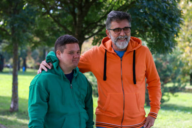 istock Young man and his dad having fun in nature 2187112592