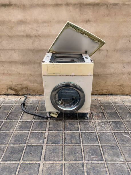 istock Broken washing machine left in the street 2187114938