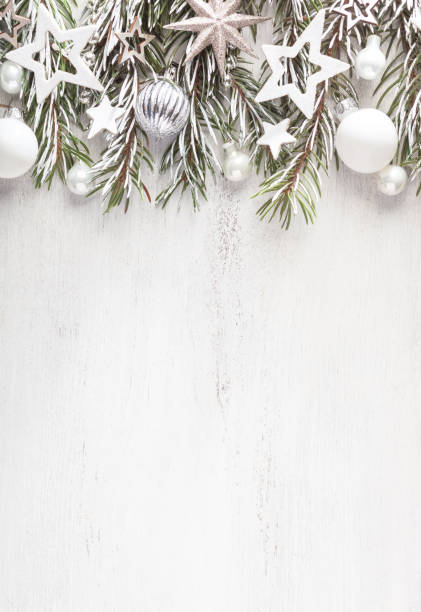 istock Fir branch with white  Christmas decorations on old wooden shabby background with empty space for text. Christmas and New Year background. 2187116809