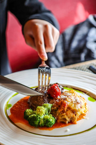 istock Gourmet beef dish with vegetables and lasagna 2187119113