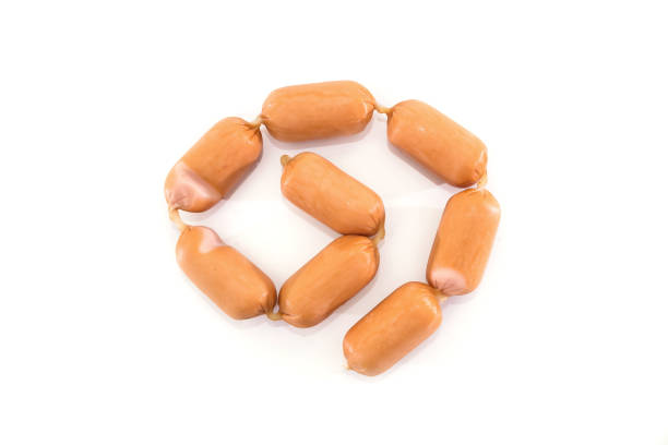 Delicious sausages on a white background