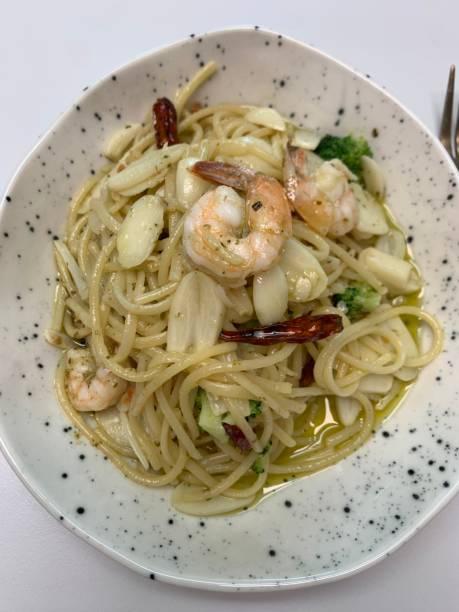 istock Spaghetti salad combines al dente pasta with fresh vegetables, tangy dressing, and optional herbs or cheese. A vibrant, refreshing dish perfect for light meals or gatherings. 2187121841