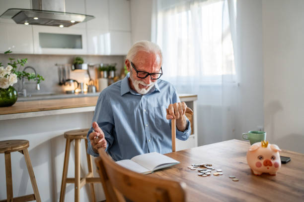 istock Senior man calculating his expenses 2187124821