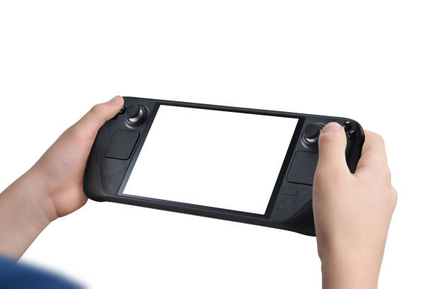 istock Child holding a handheld gaming console with isolated screen and background, ideal for promoting games and creative projects 2187127815