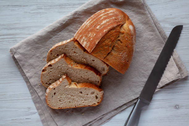 istock Homemade Sourdough Bread, top view. Flat lay, overhead, from above. 2187128017